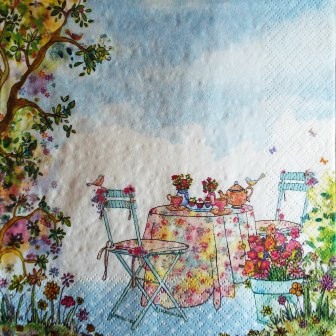 A l'heure du thé dans le jardin fleuri